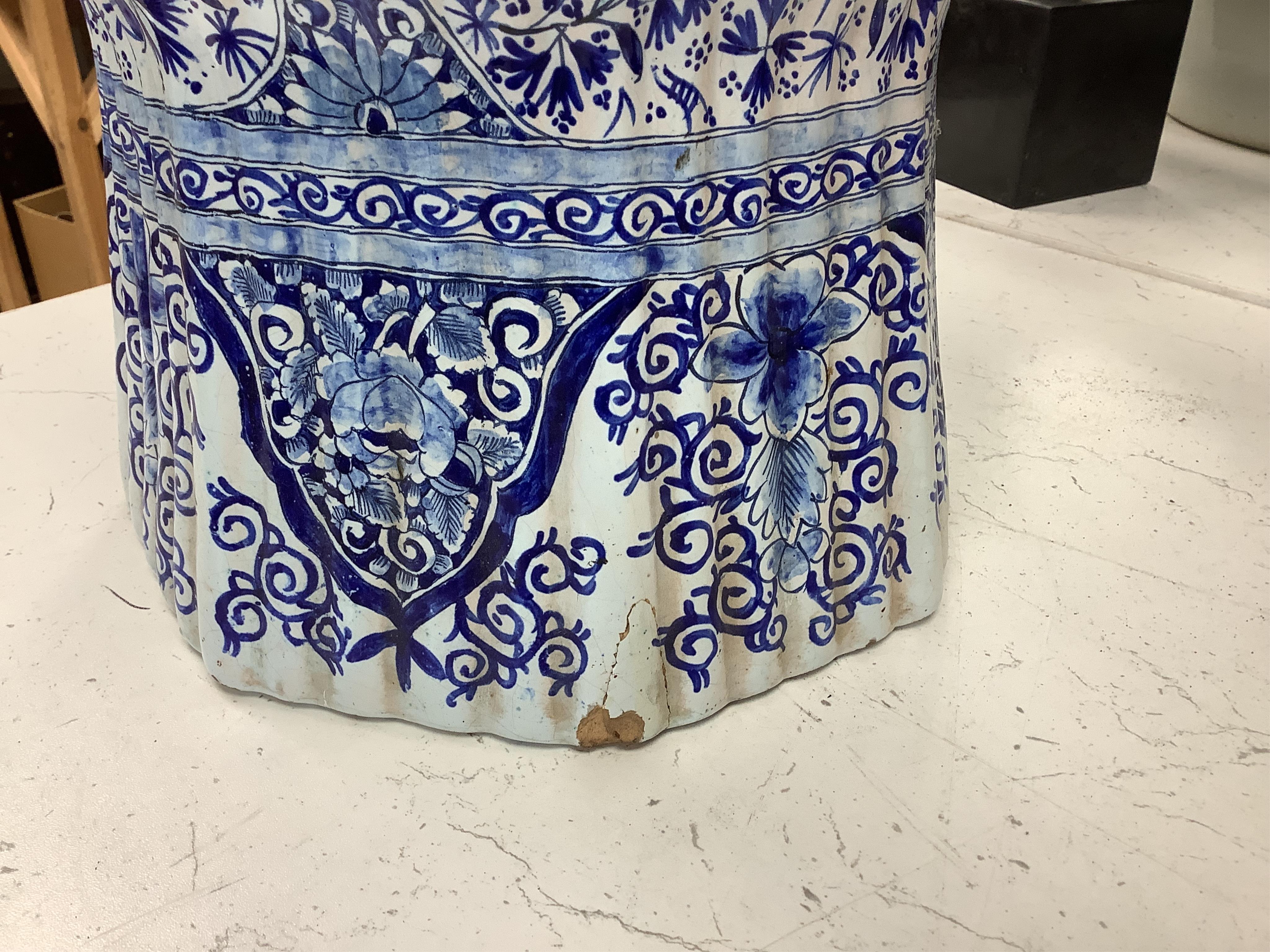 A large Delft blue and white vase and cover, 65cm tall